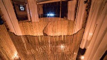 Bamboo partitions and candlelight give diners some privacy. Aromatic candles give it a spa-like atmosphere.