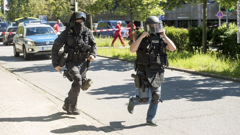 VIERNHEIM, GERMANY - JUNE 23: Heavily-armed police outside a movie theatre complex where an armed man has reportedly opened fire on June 23, 2016 in Viernheim, Germany. According to initial media reports, the man entered the cinema today at approximately 3pm, fired a shot in the air and barricaded himself inside. (Photo by Alexander Scheuber/Getty Images)