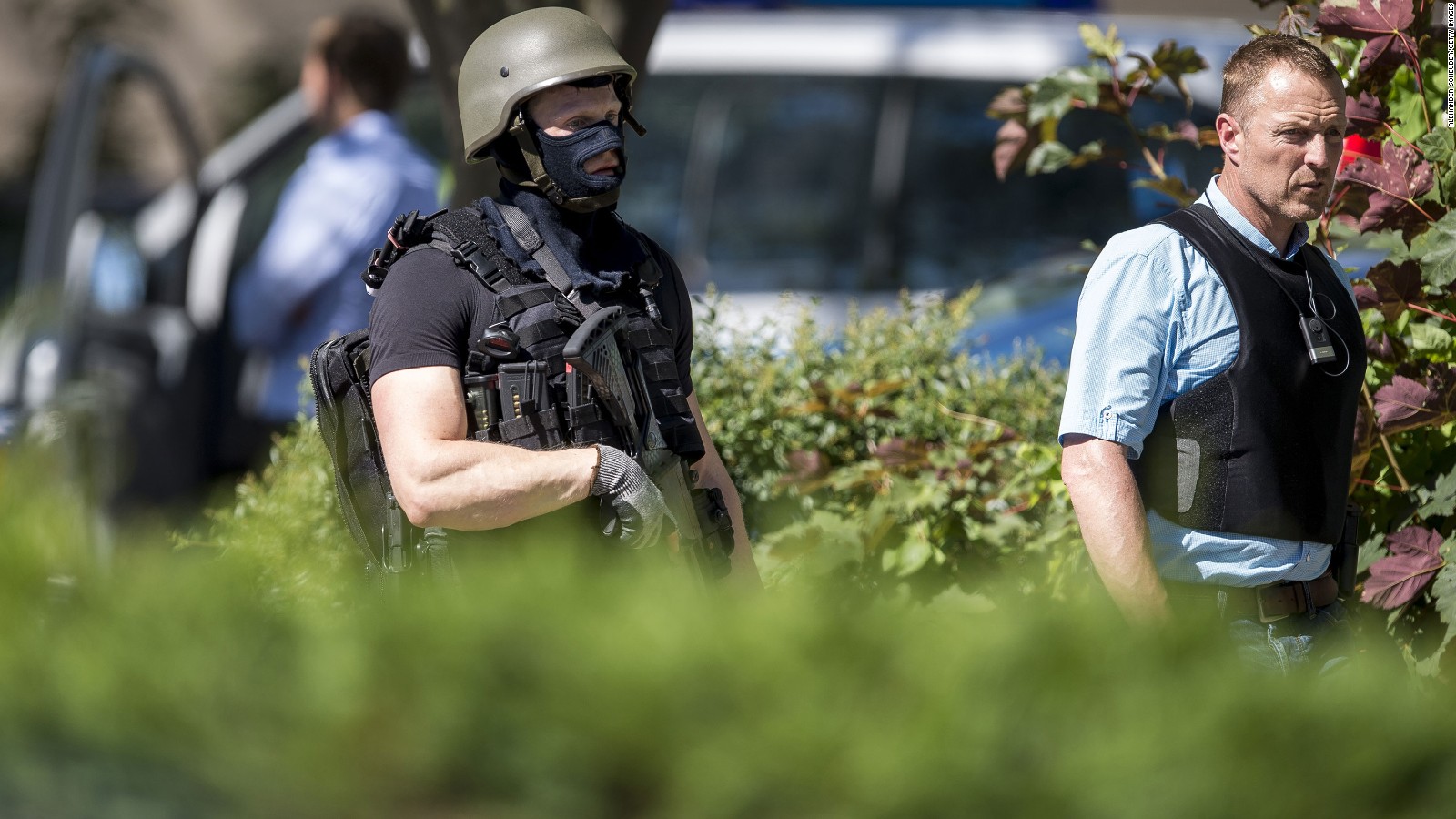 VIERNHEIM, GERMANY - JUNE 23: Heavily-armed police stand outside the movie theatre Kinopolis where an armed man has reportedly opened fire on June 23, 2016 in Viernheim, Germany. According to initial media reports, the man entered the cinema today at approximately 3pm, fired a shot in the air and barricaded himself inside. (Photo by Alexander Scheuber/Getty Images)