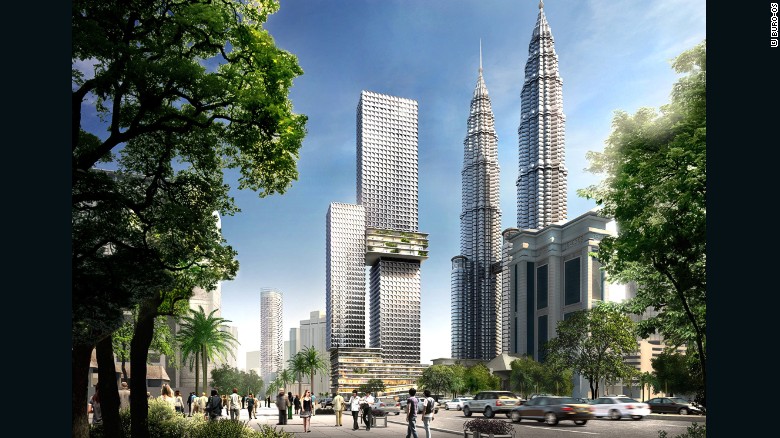 Δίπλα από την πόλη & # 39? S διάσημα Petronas Twin Towers, Κουάλα Λουμπούρ & # 39? S Angkasa Raya πύργος θα είναι 268 μέτρα ύψος με την ολοκλήρωση και θα στεγάσει ένα τετραώροφο τροπικό κήπο στη μέση της. 