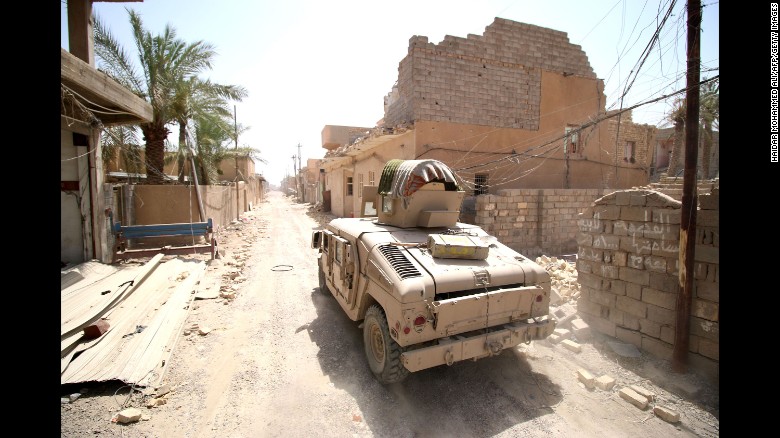 Iraqi government forces drive their armored vehicle through a street in Falluja, Iraq, on Monday, June 27, after retaking the city from ISIS. A senior Iraqi general announced on state TV that &lt;a href=&quot;http://www.cnn.com/2016/06/26/middleeast/falluja-liberated-isis/&quot; target=&quot;_blank&quot;&gt;the battle for Falluja is over&lt;/a&gt; as Iraqi troops retook the final ISIS holdout in the city.