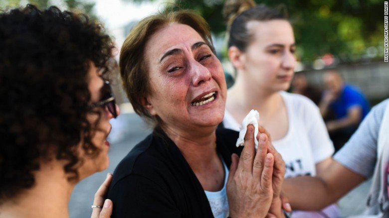 A mother of victims killed the day before in a suicide bombing and gun attack at Istanbul's airport, cries on Wednesday, June 29, in Istanbul.
