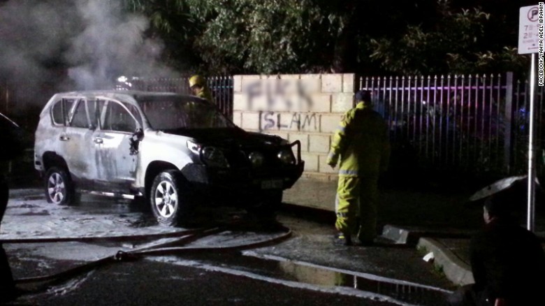 The scene outside a mosque in Paerth, Australia, where cars were set alight in an anti-Muslim attack.
