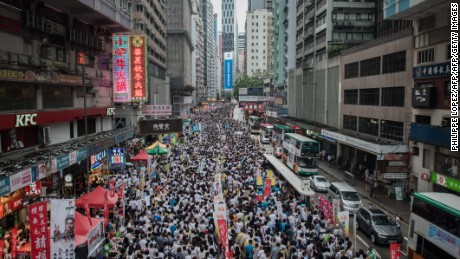 Hong Kong streets packed with protesters for July 1 march