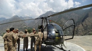 The Pakistan Army rescues flood victims by helicopter in the Chitral region.
