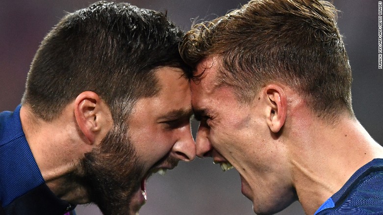 Griezmann celebrates with  Andre-Pierre Gignac after sending France through to the final.