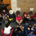 NEW YORK, NY - JUNE 21: People, many who have been there for days, wait in line with dozens of others for tickets for the popular Broadway show Hamilton on June 21, 2016 in New York City. The Tony Award-winning Broadway hit has drawn huge crowds to the Richard Rogers theater in tin he hopes of getting increasingly scarce and expensive tickets. Carrying bed rolls, pillows and take-out food containers, many fans of the musical wait days in the heat and rain for a chance to get a cancellation ticket which are offered to the public once they're declined by members of the cast and crew. (Photo by Spencer Platt/Getty Images)