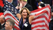 Delegates react on the floor after the push for a roll call vote on Monday.