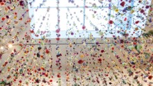 Artist Rebecca Louise Law is known for her vast installations comprised of cut flowers. Galleries and private patrons have commissioned the in-demand Brit to fill their spaces with up to 150,000 flowers, which gradually decompose before drying out.