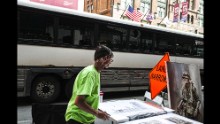 Vendors line the street near the convention, selling everything from paintings to Trump apparel to Cavaliers memorabilia.