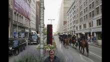 Police patrol Euclid Avenue before the convention started on Wednesday.