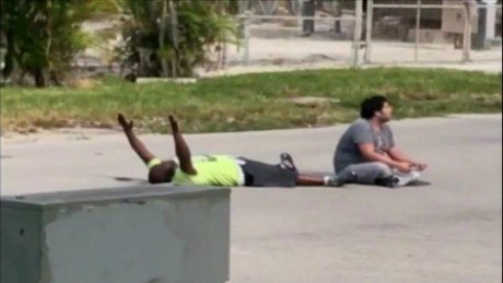 Miami shooting: Man was on ground with hands up, he says