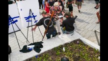 Two men hold firearms in Cleveland's Public Square. "I've seen open carry before but not quite in these numbers," van Agtmael said.