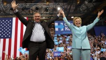 Democratic presidential candidate former Secretary of State Hillary Clinton and Democratic vice presidential candidate U.S. Sen. Tim Kaine (D-VA) greet supporters during a campaign rally at Florida International University Panther Arena on July 23, 2016 in Miami, Florida. Hillary Clinton and  Tim Kaine made their first public appearance together a day after the Clinton campaign announced Senator Kaine as the Democratic vice presidential candidate.  