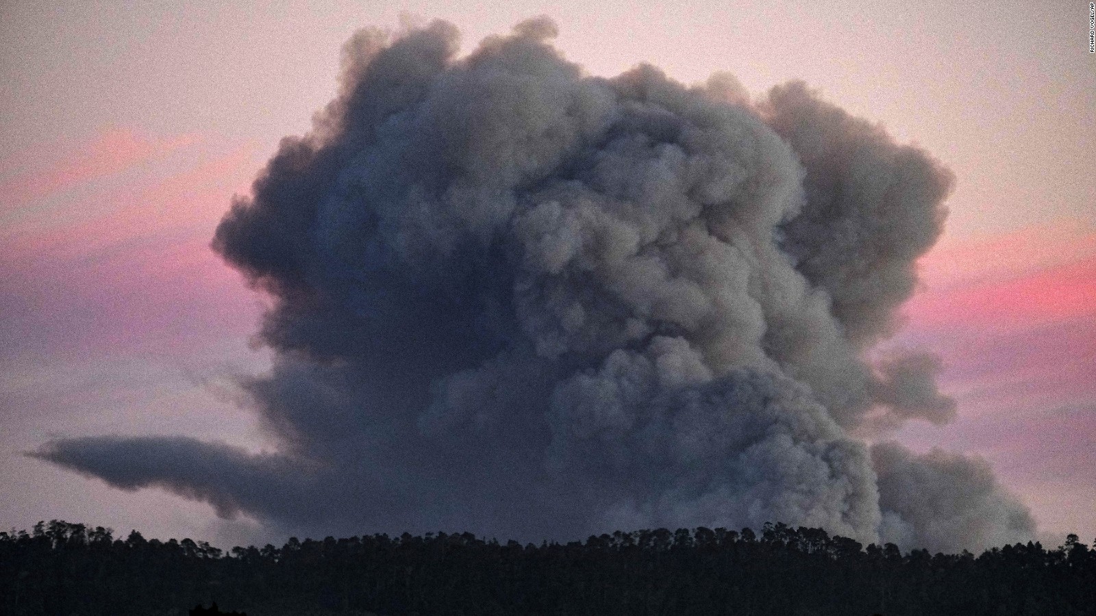 A large plume of smoke from a wildfire rises near Highway 1, burning five miles south of Carmel, California, on Friday, July 22.