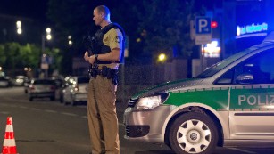 A police officer stands guard in Ansbach. 