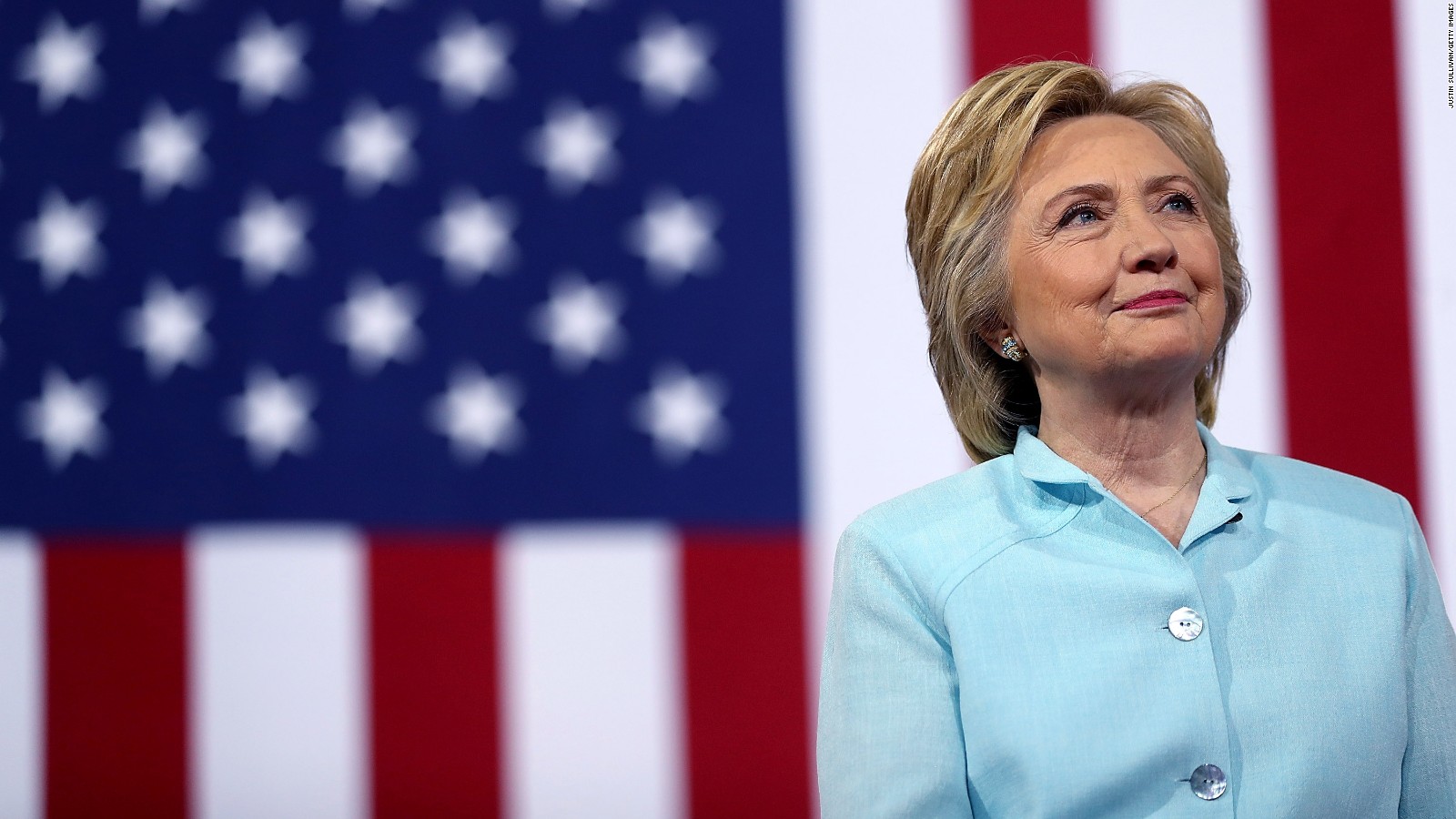 MIAMI, FL - JULY 23: Democratic presidential candidate former Secretary of State Hillary Clinton looks on as her running mate Democratic vice presidential candidate U.S. Sen. Tim Kaine (D-VA) speaks during a campaign rally at Florida International University Panther Arena on July 23, 2016 in Miami, Florida. Hillary Clinton and Tim Kaine made their first public appearance together a day after the Clinton campaign announced Senator Kaine as the Democratic vice presidential candidate.
