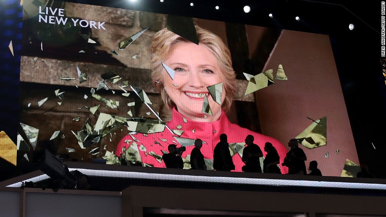 PHILADELPHIA, PA - JULY 26: A screen displays Democratic presidential candidate Hillary Clinton delivering remarks during the evening session on the second day of the Democratic National Convention at the Wells Fargo Center, July 26, 2016 in Philadelphia, Pennsylvania. Democratic presidential candidate Hillary Clinton received the number of votes needed to secure the party&#39;s nomination. An estimated 50,000 people are expected in Philadelphia, including hundreds of protesters and members of the media. The four-day Democratic National Convention kicked off July 25. (Photo by Drew Angerer/Getty Images)