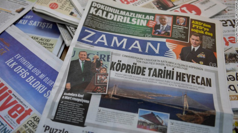 A photo taken in Ankara on March 6, 2016 shows the front page of the first new edition of the Turkish daily newspaper Zaman, which had staunchly opposed the president, now with articles supporting the government since its seizure by authorities.