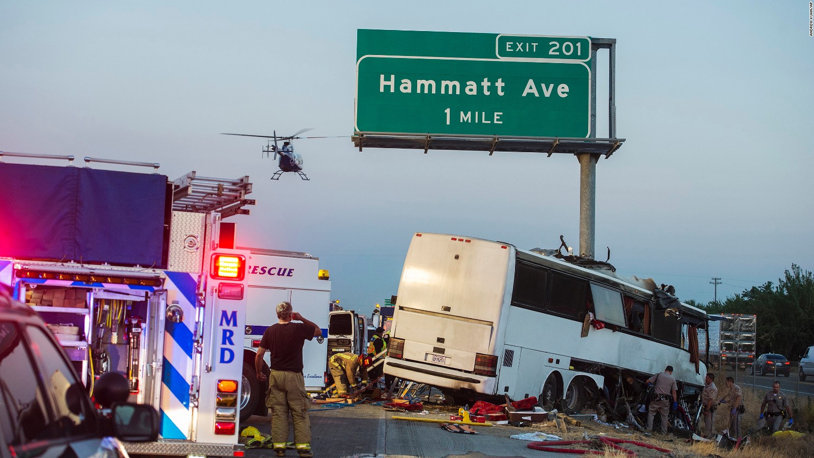A charter bus veered off a central California freeway before dawn Tuesday and slammed into a pole.