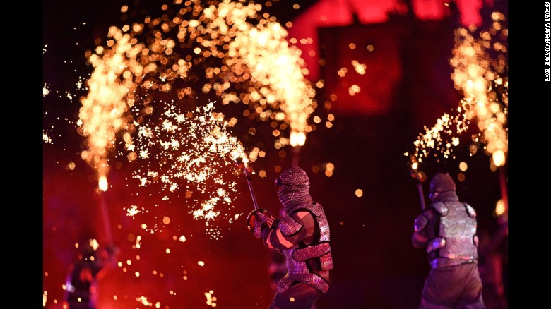 Dancers perform during the opening ceremony at the Maracana Stadium.