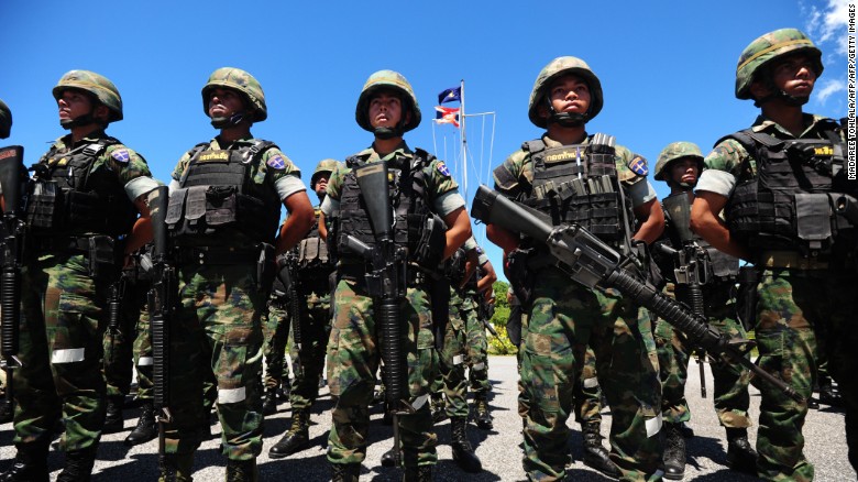 Soldiers stood guard ahead of the referendum in Thailand&#39;s tense southern province of Narathiwat.