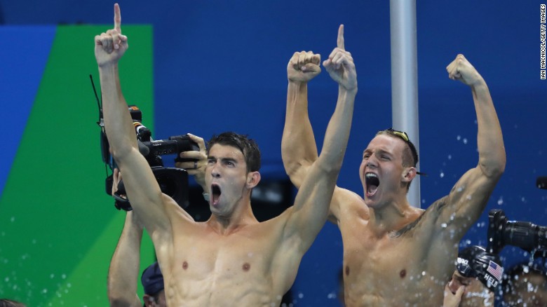 Michael Phelps and Caeleb Dressel of United States celebrate their win the men's 4 x 100m freestyle relay on day 2 of the Rio 2016 Olympic Games on Sunday, August 7.