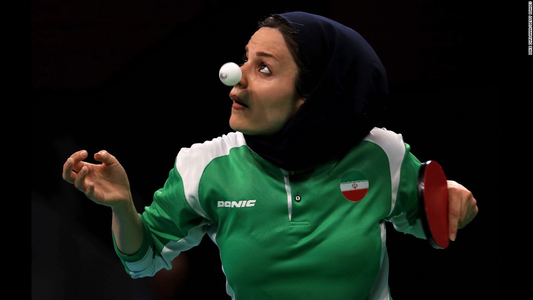 Iran's Neda Shahsavari plays a first-round table tennis match on Saturday, August 6.