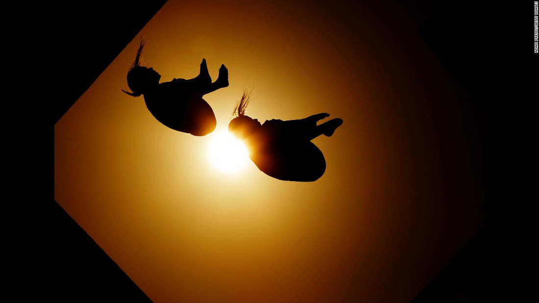 Synchronized divers train on Thursday, August 4.