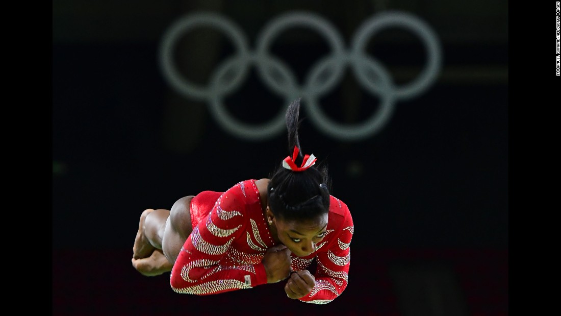 U.S. gymnast Simone Biles -- the reigning world champion in the all-around -- trains on the vault on Thursday, August 4.