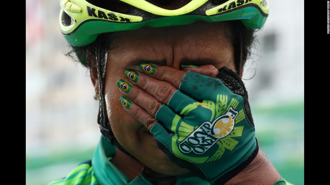 Brazilian cyclist Clemilda Fernandes reacts after finishing the women's road race on Sunday, August 7.