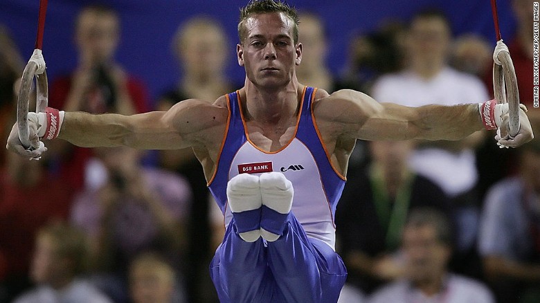 Yuri van Gelder performing on the rings at the 2006 world championships.