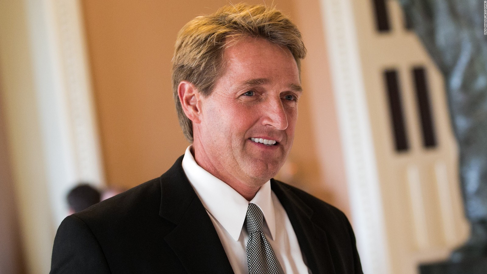 Sen. Jeff Flake (R-AZ) walks to a Senate joint caucus meeting, on Capitol Hill, July 15, 2013 in Washington, DC.
