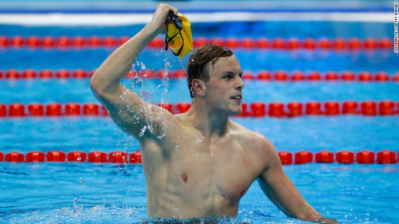 Kyle Chalmers of Australia celebrates after winning gold in the Men&#39;s 100m freestyle final.