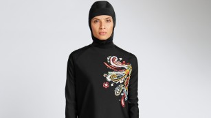 A model wears a full-body bathing suit, or burkini, from Marks and Spencer.