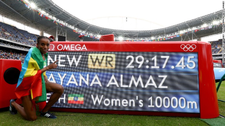 Ethiopia&#39;s Almaz Ayana celebrates winning the women&#39;s 10,000m final.