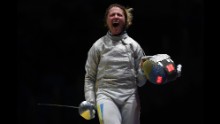 Ukraine's Olga Kharlan celebrates after winning the women's team sabre quarterfinal bout against South Korea.