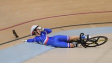 France's Virginie Cueff falls during the women's keirin first round track cycling event.