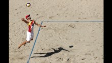 Adrian Gavira Collado of Spain serves the ball during a men's round of 16 match.