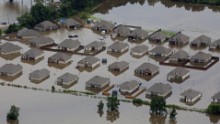 An aerial view of flood-damaged homes in Hammond on August 13.