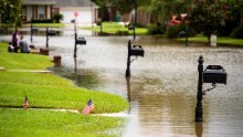 Floodwaters inundate a street in Youngsville on August 14.