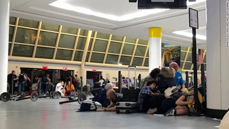 Passengers at immigration control were told to get down while police looked for an active shooter.

