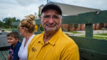 Youngsville police Chief Rickey Boudreaux takes a break from helping flood victims to view the damage to his own home on Sunday, August 14.
