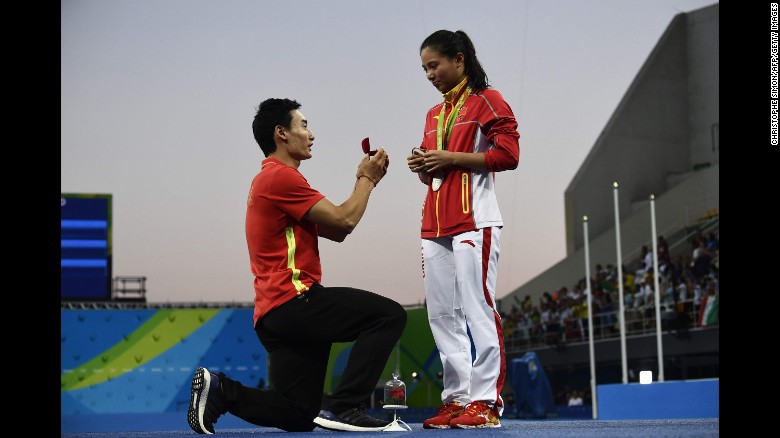 China's Qin Kai &lt;a href=&quot;http://www.cnn.com/2016/08/14/sport/china-diving-marriage-proposal-rio-2016-olympics/index.html&quot; target=&quot;_blank&quot;&gt;proposes to fellow diver He Zi&lt;/a&gt; after she received silver in the 3-meter springboard on Sunday, August 14.