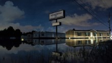 Floodwaters surround prefabricated houses in Denham Springs, Louisiana, on August 15.