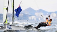 Gold is in the bag for Peter Burling (helm) and Blair Tuke of New Zealand in the men's 49er