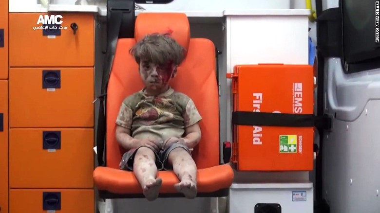 This still image, taken from a &lt;a href=&quot;https://www.youtube.com/watch?v=7cfBmRW3isc&quot; target=&quot;_blank&quot;&gt;video posted by the Aleppo Media Center,&lt;/a&gt; shows a young boy in an ambulance after an airstrike in the northern Syrian city of Aleppo on Wednesday, August 17. The boy has been identified as Omran Daqneesh, and the video of him has been circulating on social media.