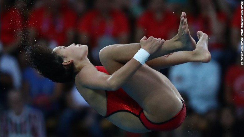 Ren Qian: 15-year-old “perfectionist” wins Olympic diving gold for China