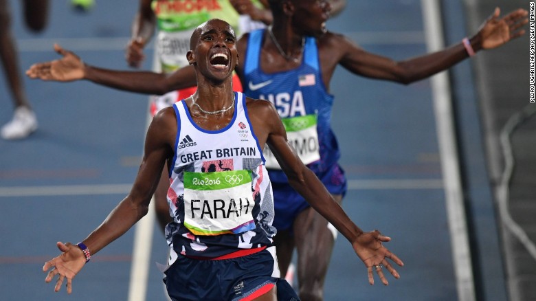 Mo Farah celebrates after crossing the finish line to win the men&#39;s 5000m final at Rio 2016.