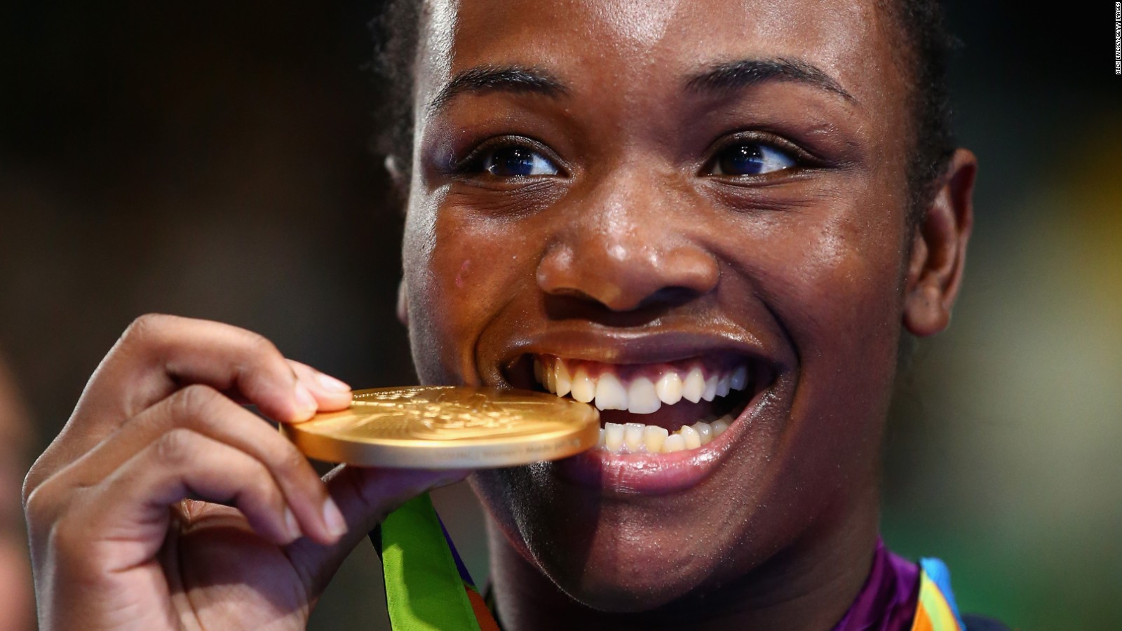 Gold medalist Claressa Maria Shields of the United States poses on the podium during the medal ceremony for the Women's Boxing Middle (69-75kg) on Day 16 of the Rio 2016 Olympic Games at Riocentro - Pavilion 6 on August 21, 2016 in Rio de Janeiro, Brazil.